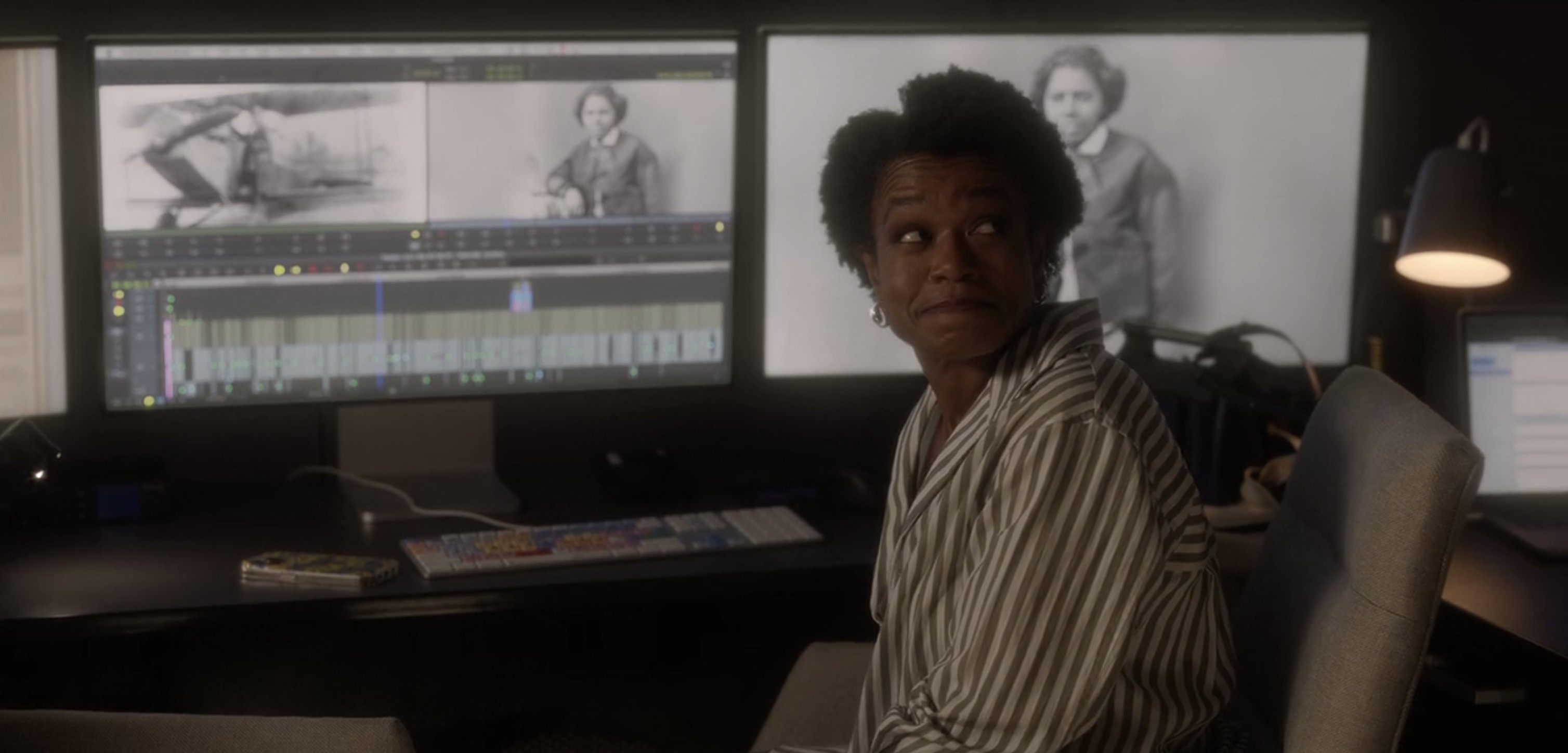 character sitting in front of the monitor