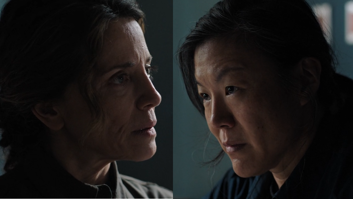 The Last of Us 205: Hanrahan and Park sit across the table from one another