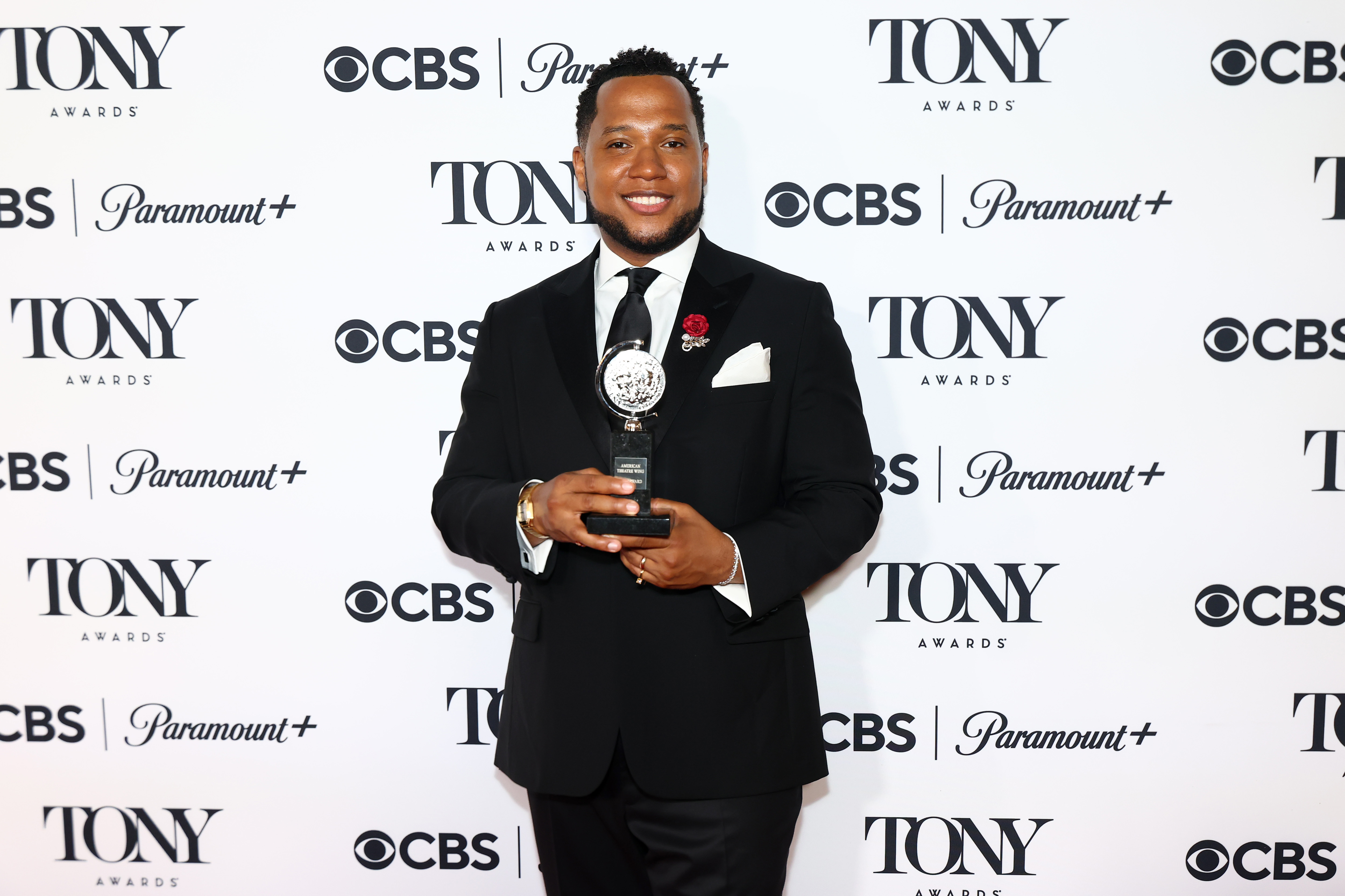Branden Jacobs-Jenkins poses with the Best Play award for "Purpose"