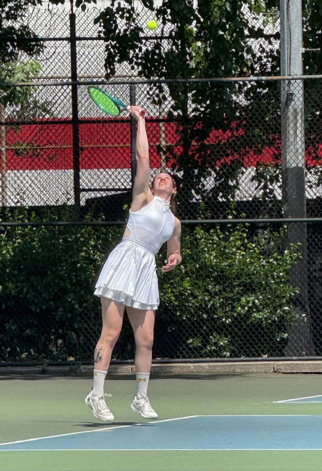 Cammie Woodman playing tennis