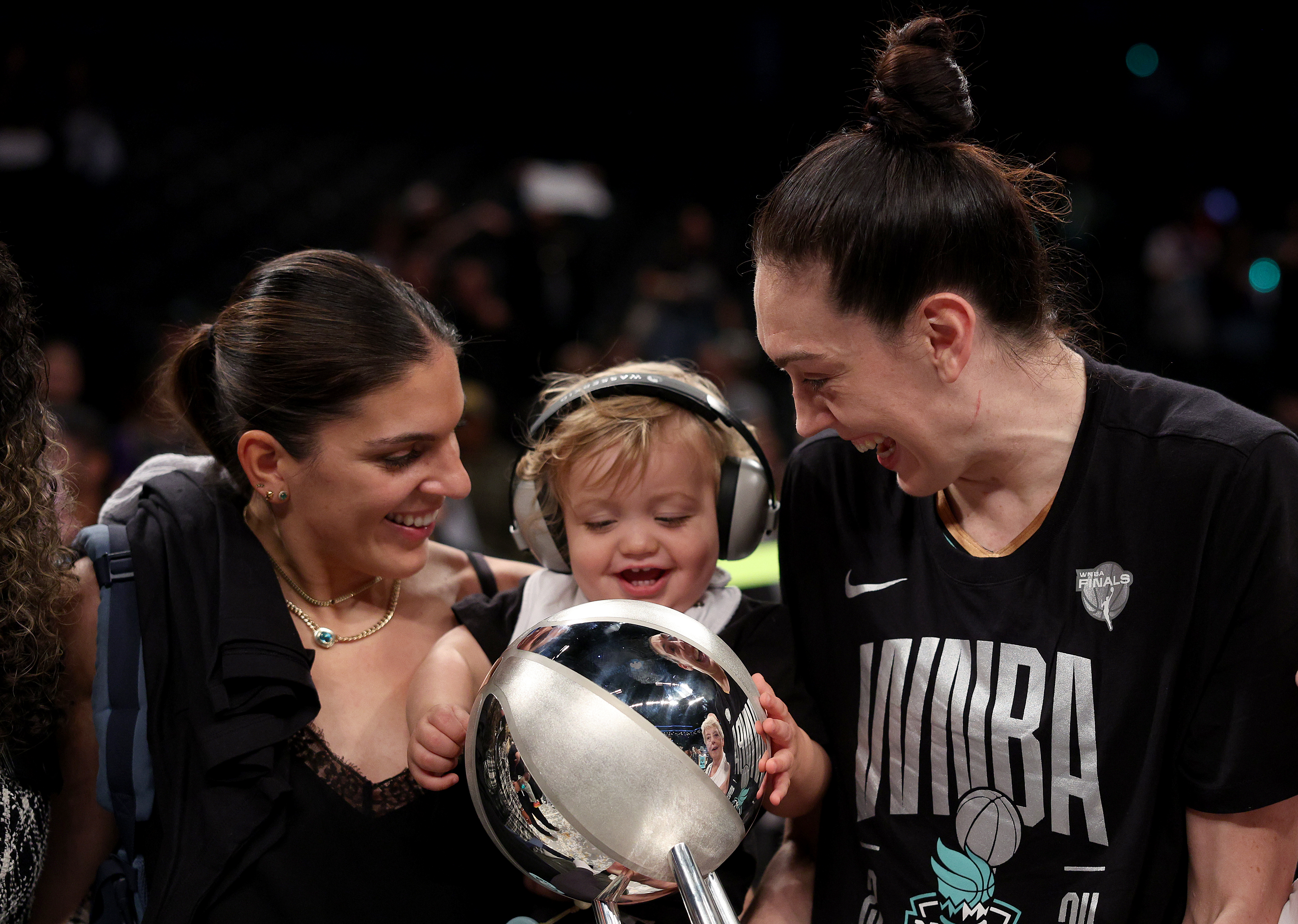 NEW YORK, NEW YORK - OCTOBER 20: Marta Xargay Casademont celebrates with her wife, Breanna Stewart #30 of the New York Liberty, after Game Five of the WNBA Finals against the Minnesota Lynx at Barclays Center on October 20, 2024 in the Brooklyn borough of New York City. The New York Liberty defeated the Minnesota Lynx 67-62 in overtime to win the championship. NOTE TO USER: User expressly acknowledges and agrees that, by downloading and or using this photograph, User is consenting to the terms and conditions of the Getty Images License Agreement. (Photo by Elsa/Getty Images)