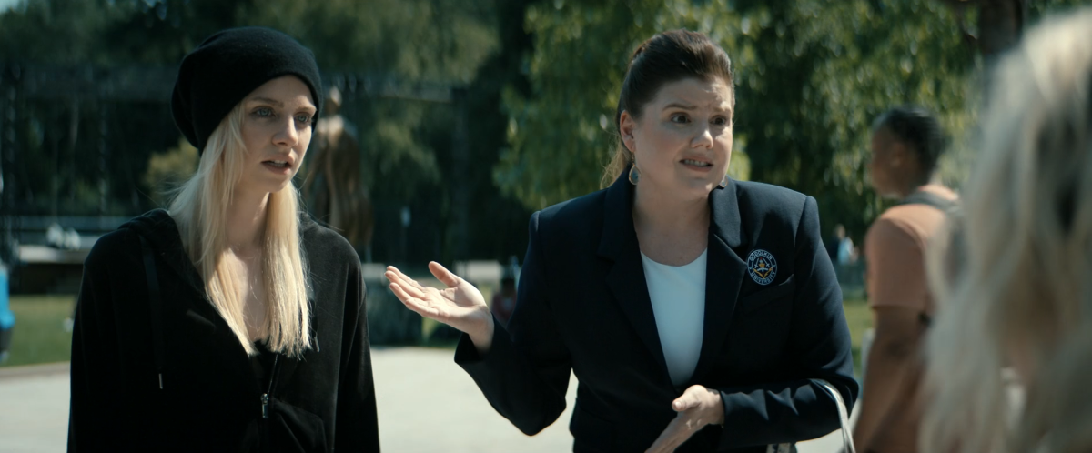Gen V 203: Stacy presents Cate who is glaring because she sees the "friends" who attacked her