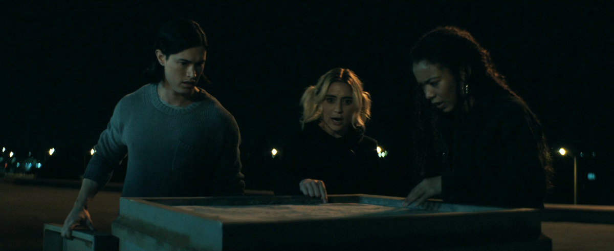 Gen V 205: jordan, emma, and marie on the roof of elmira looking at the bricked up vent