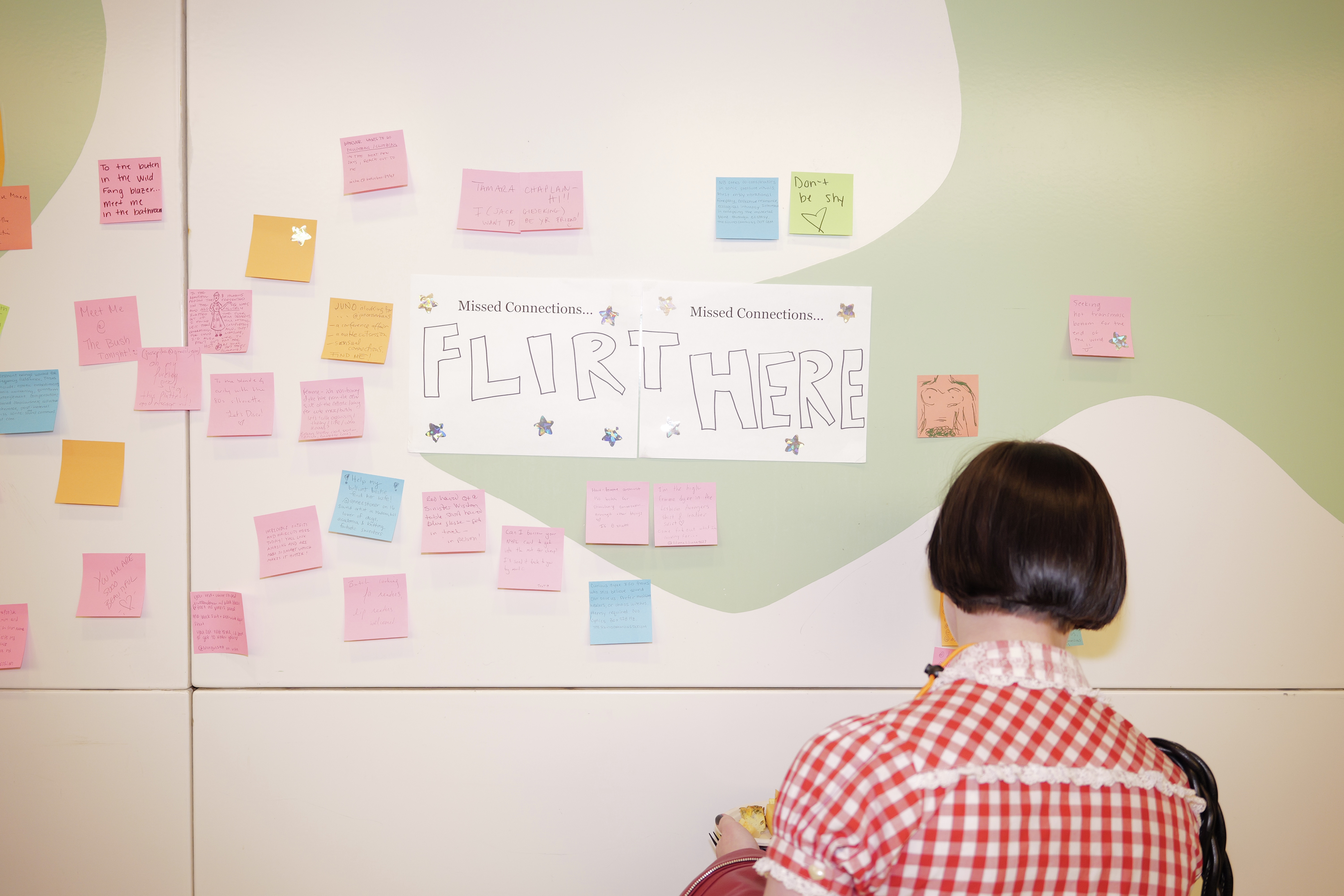 the missed connections wall at the Lesbian Lives conference