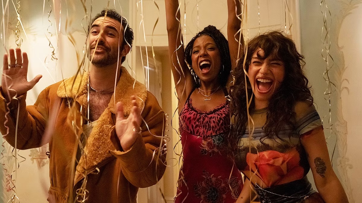 three girls screaming at a party