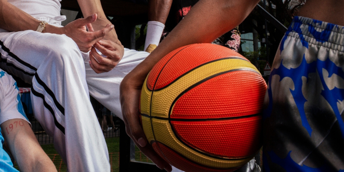 a woman holding a basketball