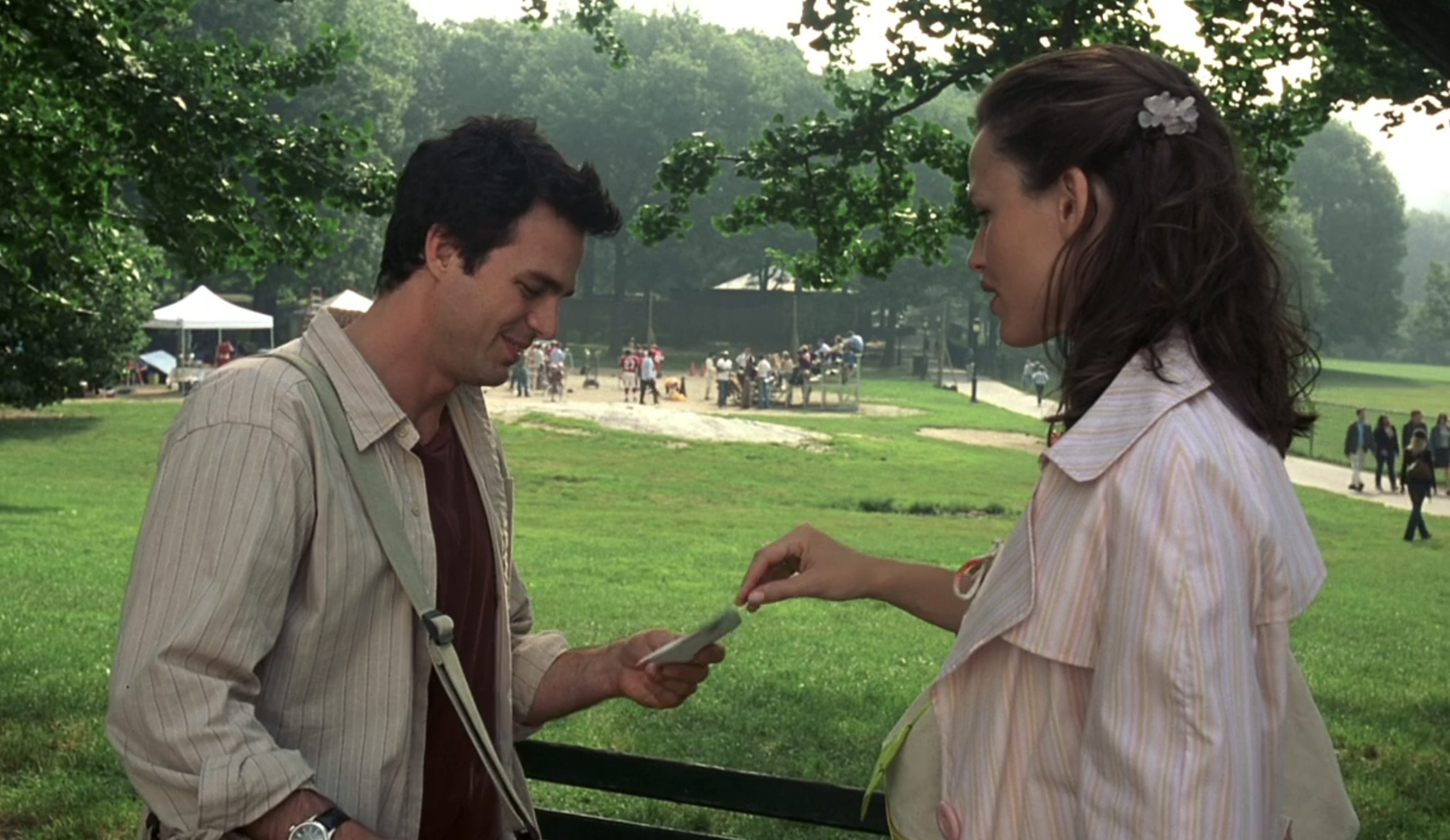 jen handing mark a check in 13 going on 30