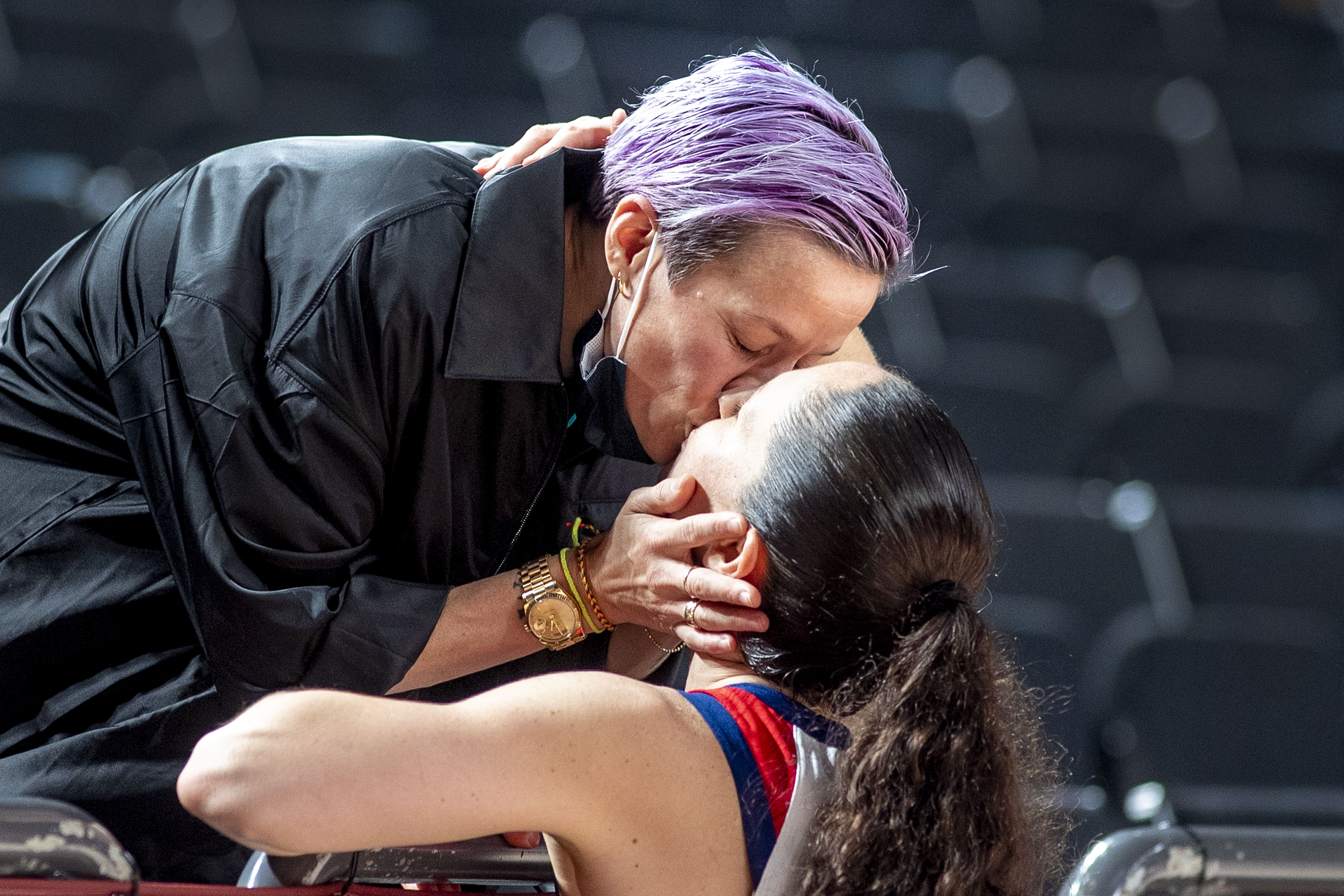 TOKYO, JAPAN August 8: Sue Bird #6 of the United States is congratulated with a kiss from her fiancee US soccer player Megan Rapinoe after the United States victory during the Japan V USA basketball final for women at the Saitama Super Arena during the Tokyo 2020 Summer Olympic Games on August 8, 2021 in Tokyo, Japan. (Photo by Tim Clayton/Corbis via Getty Images)