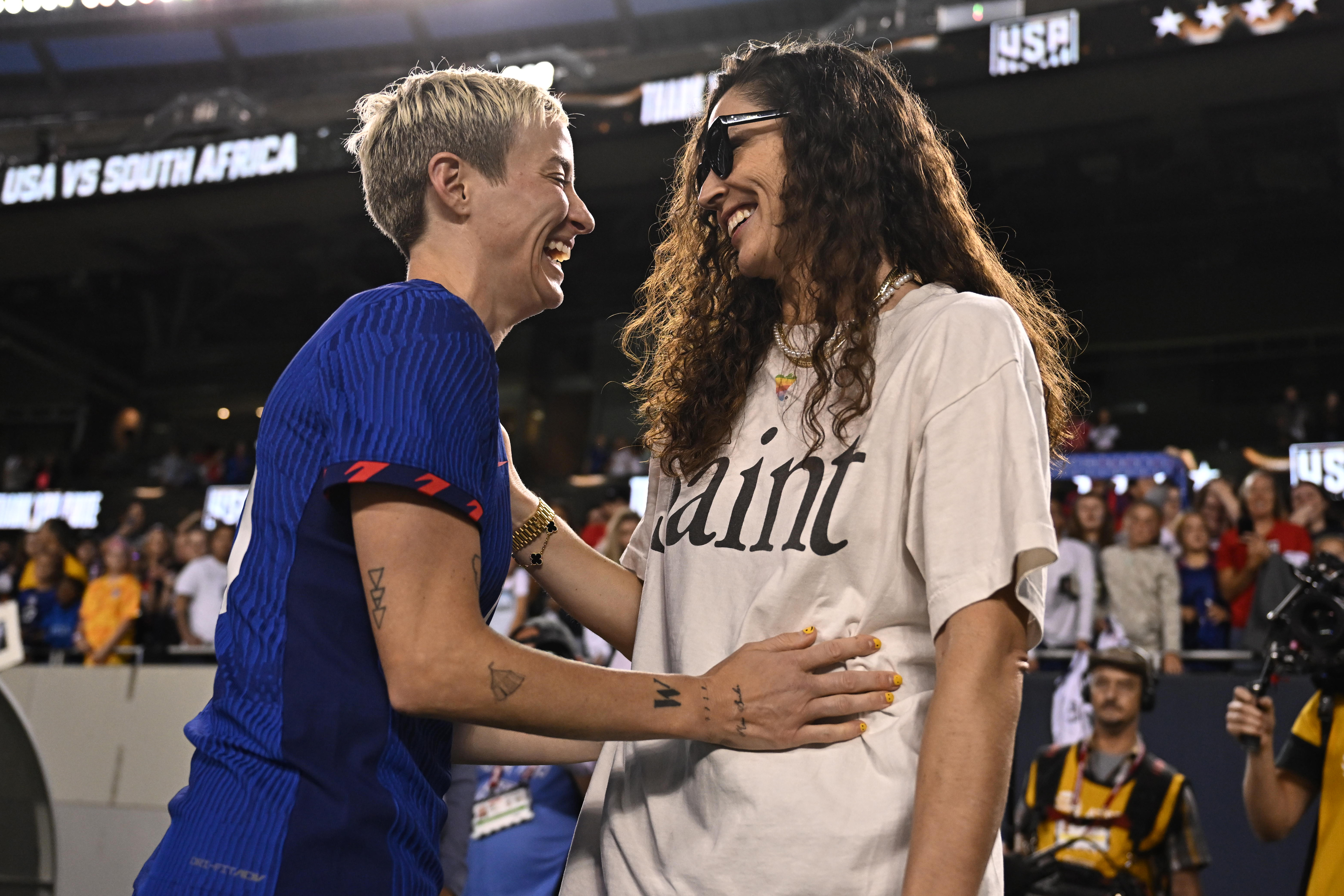 CHICAGO, ILLINOIS - SEPTEMBER 24: Megan Rapinoe #15 of the United States and her partner and former WNBA player Sue Bird after playing South Africa during an international friendly at Soldier Field on September 24, 2023 in Chicago, Illinois. (Photo by Daniel Bartel/ISI Photos/USSF/Getty Images for USSF)