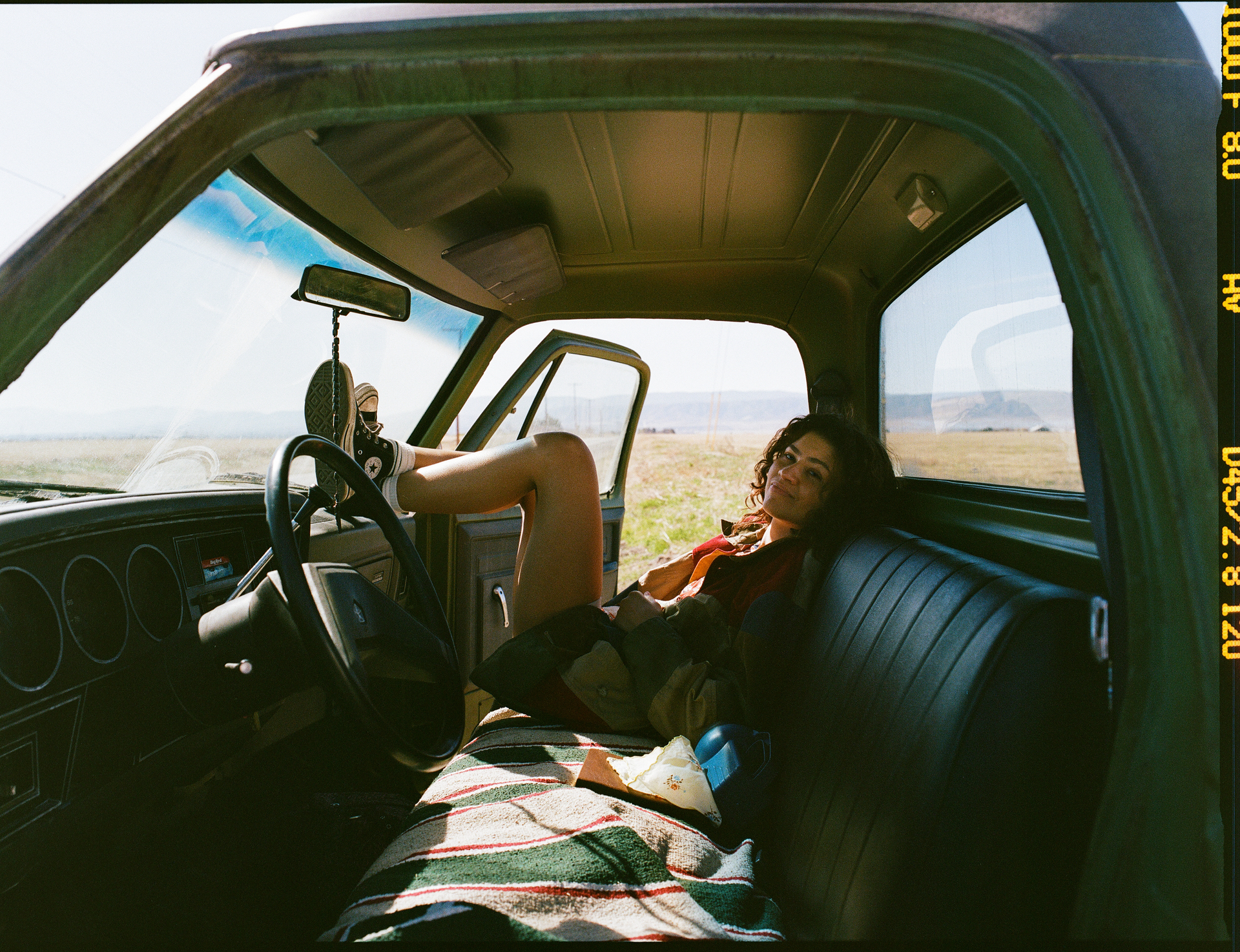 zendaya in a car looking surly
