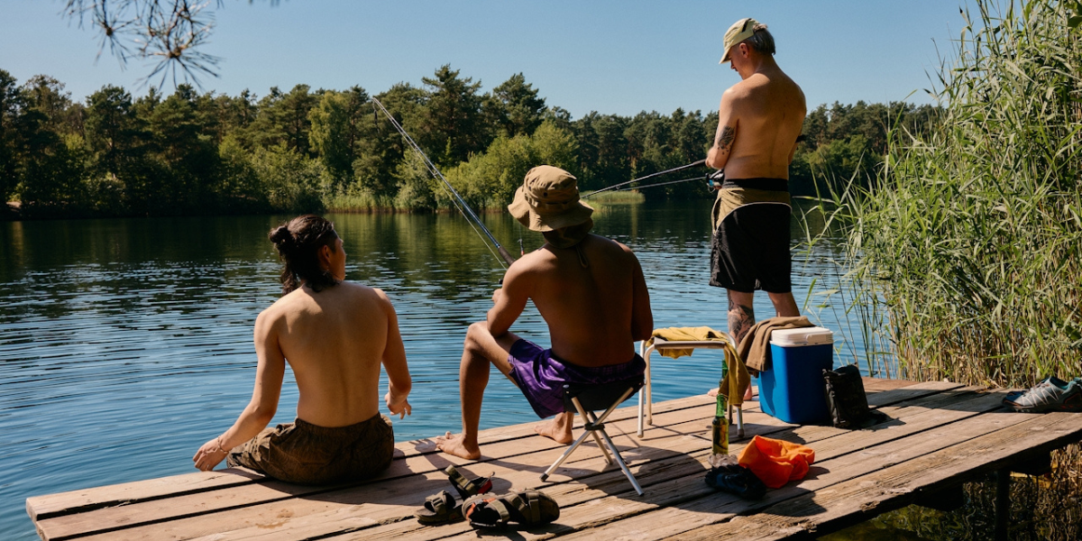 three dudes chillin and fishin