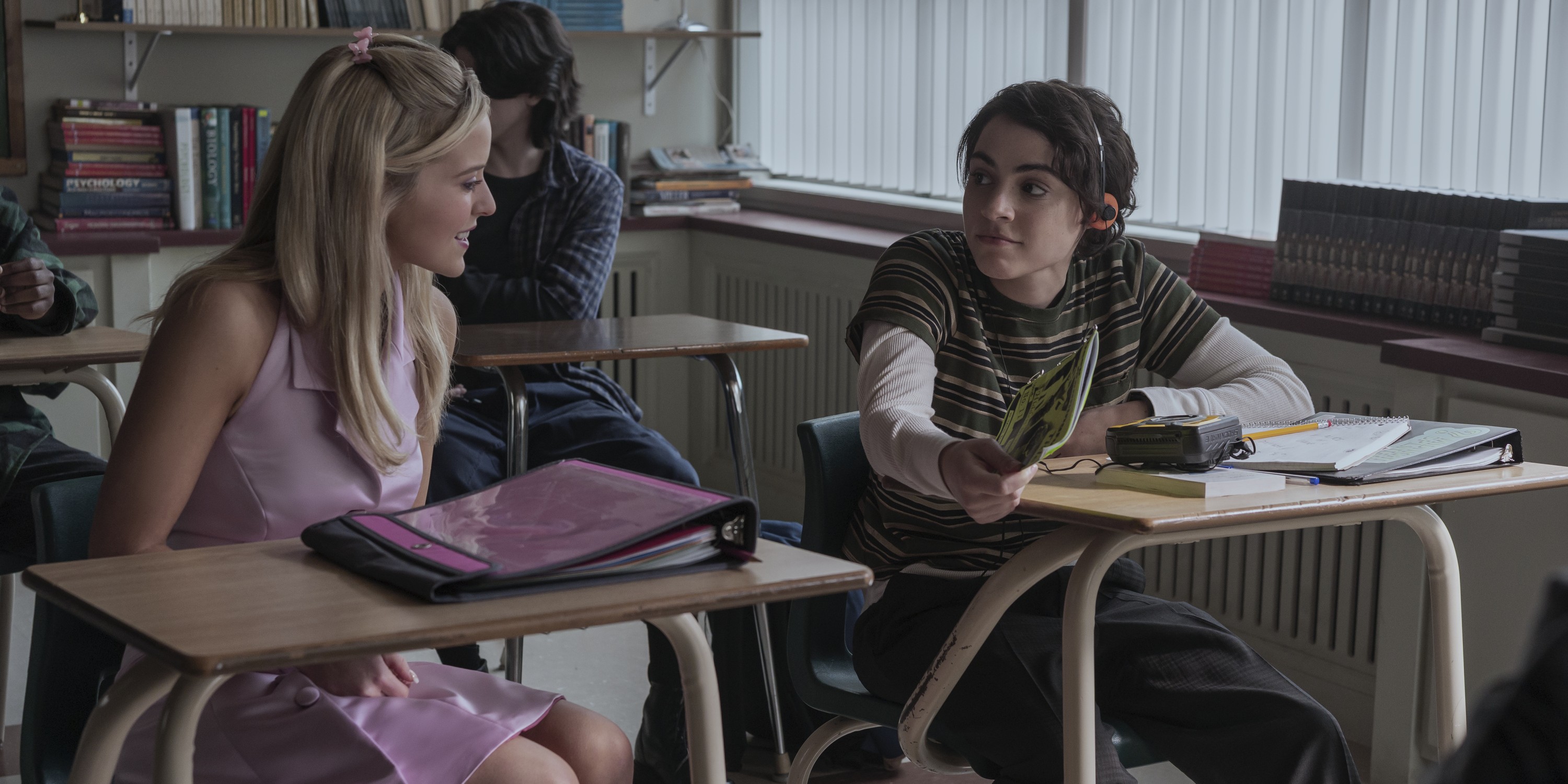 Press still from Elle of Elle Woods and Liz the Lizbian in class