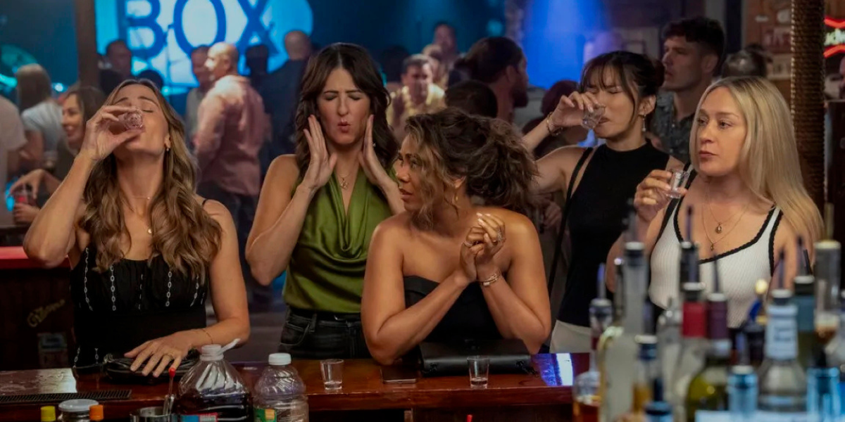 the women of Five-Star Weekend drinking at a bar
