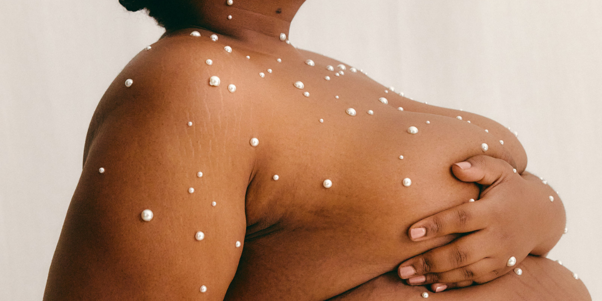 a body covered in gems