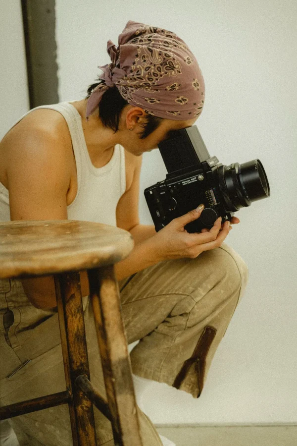 nicol taking a photograph