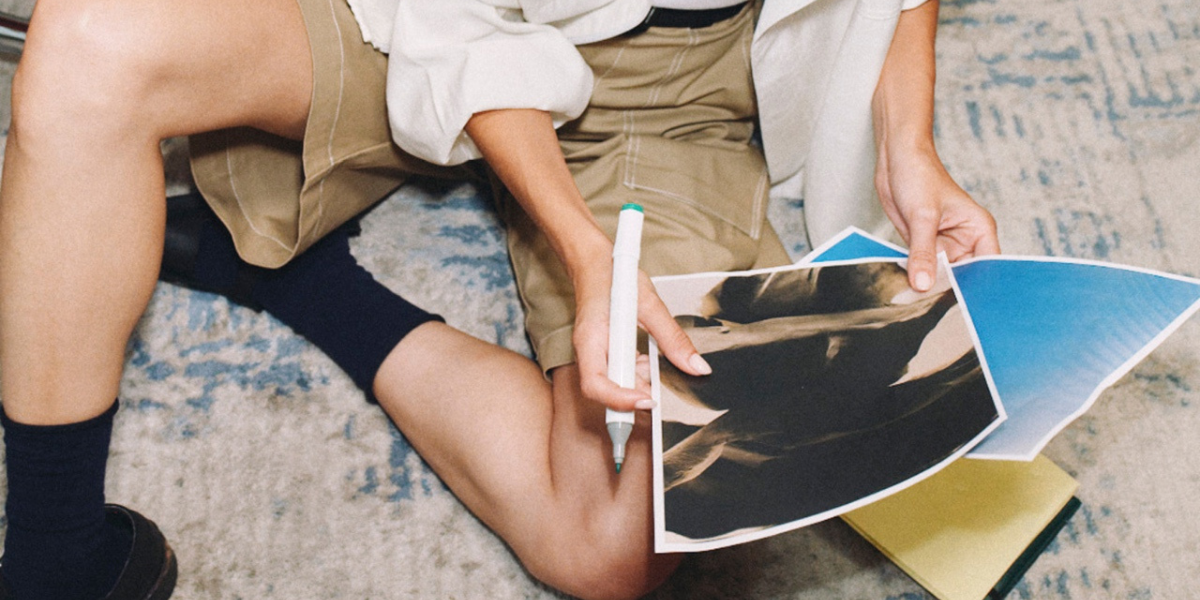 a person sorting through papers