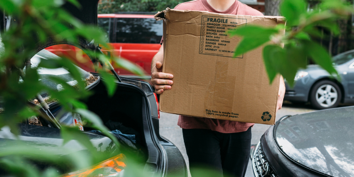a person with a moving box