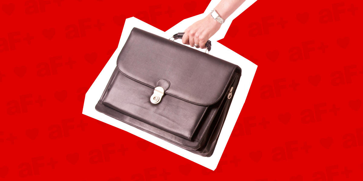 woman holding briefcase