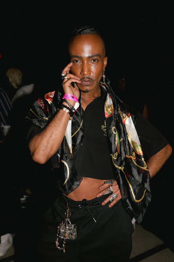 Model Brandon Jerrod strikes a pose backstage after walking the runway for the first time.