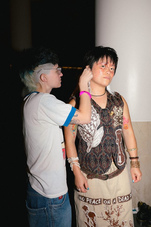 Fi, one of the designers behind Dykemint styles their model Clae in their runway look.