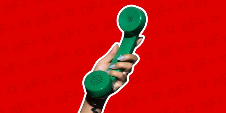 hand holding a telelphone