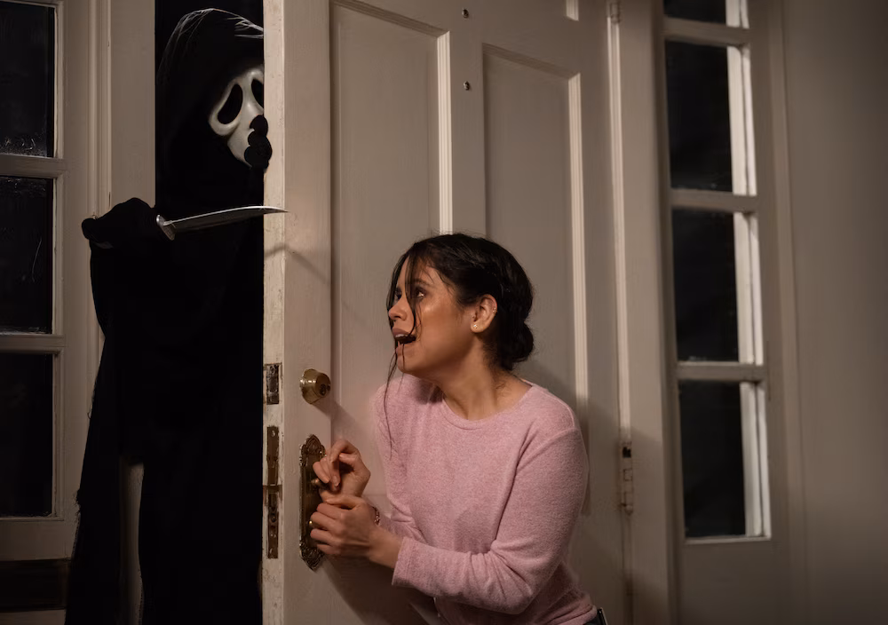 Jenna Ortega and Ghostface in Scream movie from 2022