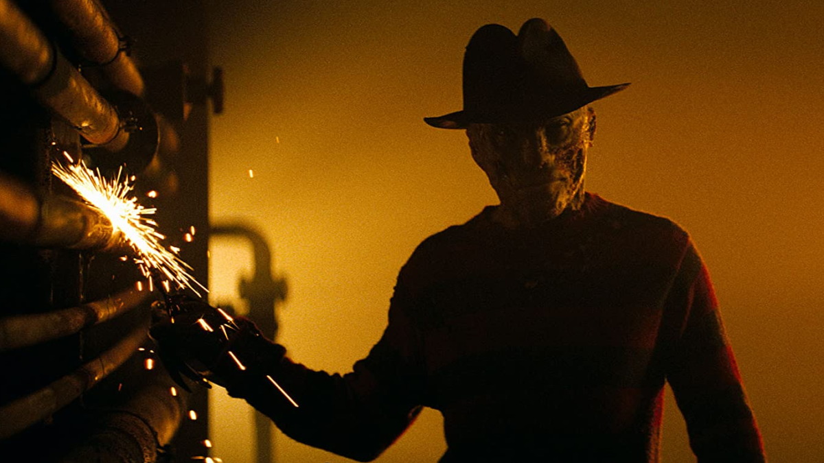 Freddy Krueger scratching his knives nails against metal