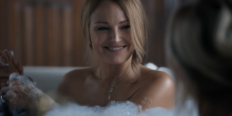 Margo in The Hunting Wives in a bubble bath with Sophie. From the season 2 trailer